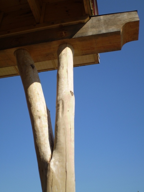Round wood column detail at Timber beam